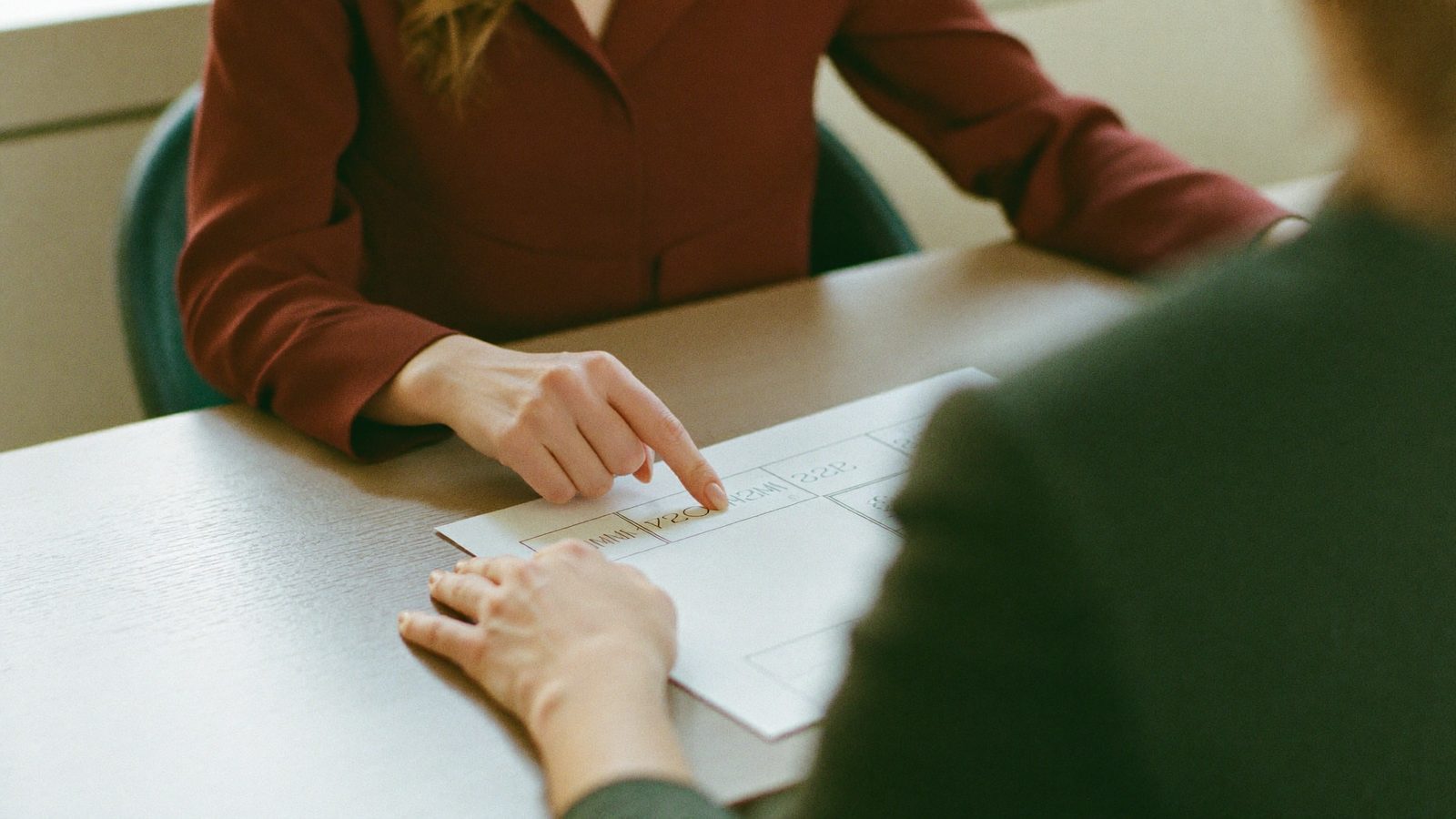 An advisor meeting with an older couple